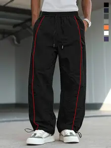 Men's wide-leg sweatpants with drawstring and side stripes, comfortable and breathable casual wear suitable for outdoor activities and versatile enough for year-round use Athleisure Style pantalones para hombre holiday work party outfit