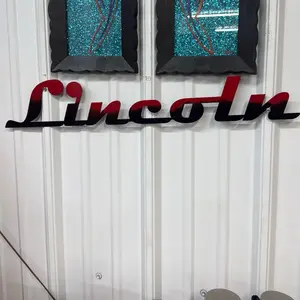 Two toned black and red powder coated Lincoln Sign