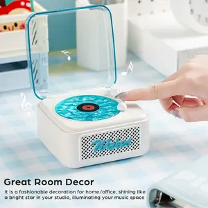 Retro record player Bluetooth speaker delivering soothing ocean sounds, ambient lamp glow and compact portable design