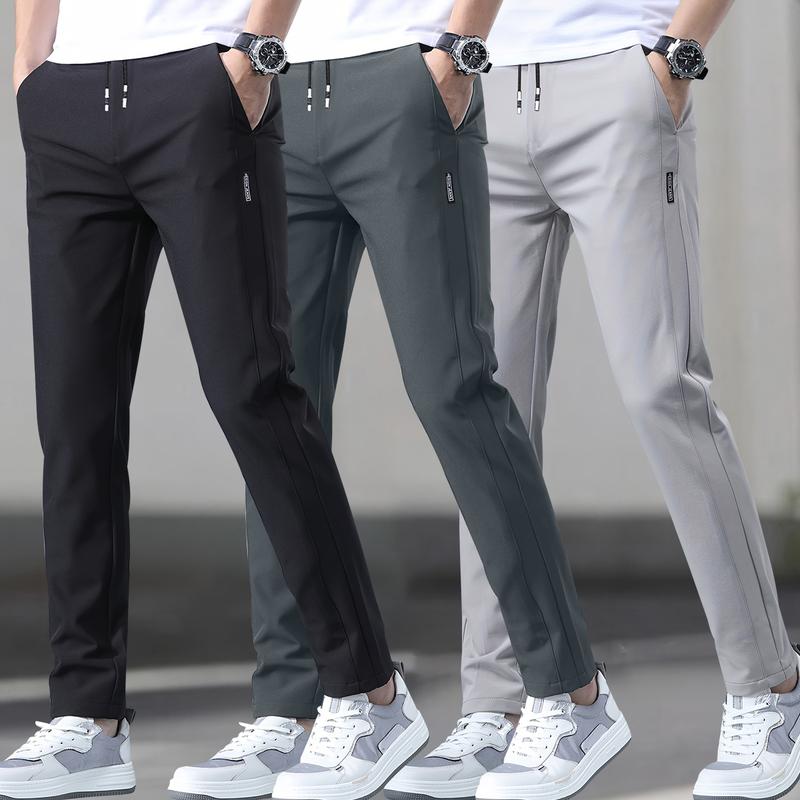 Men's 3-pack slim fit straight leg casual pants, polyester spandex blend, featuring an elastic waistband with drawstring, mid-rise, side pockets, suitable for outdoor activities and everyday wear