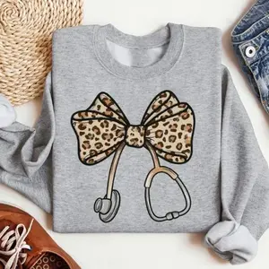 Nurse Leopard Bow Sweatshirt, Stethoscope Bow Shirt, Nurse Coquette Shirt, Gift for Nurse, Healthcare Shirt, Nurse Appreciation