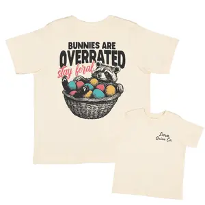 Youth & Adult Bunnies Are Overrated Funny Easter Raccoon T-Shirt, Stay Feral Graphic Tee Easter Egg Hunt Humor Shirt, Spring Holiday Gift, Youth Clothes, Trending Tees, Kids Clothing, Family Shirt, Birthday Gift, Perfect Gift for Holiday
