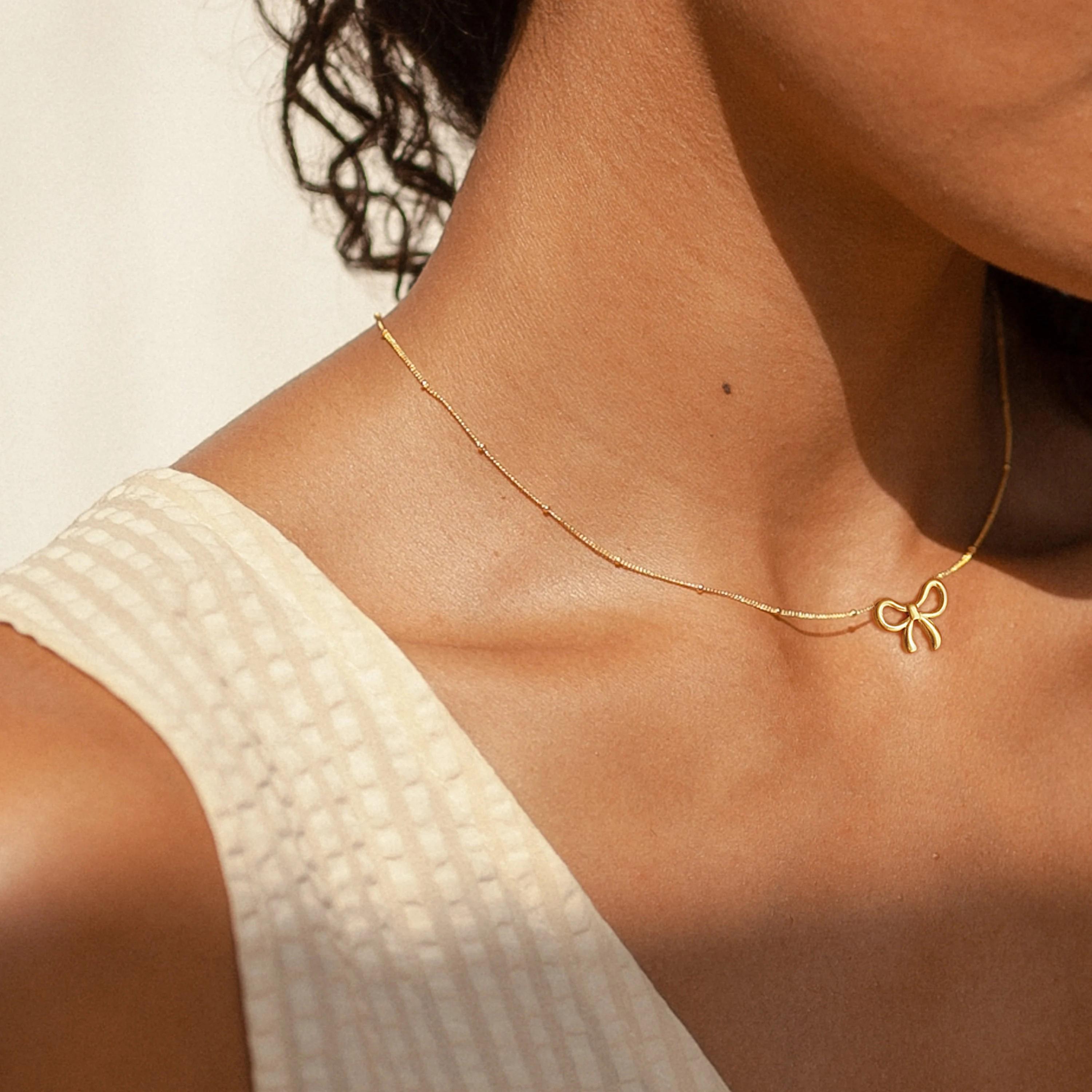 17KM 14K Gold Plated Bow Necklace for Women - Dainty Tiny Cute Bow Pendant Choker Chain - Adjustable Length with Lobster Clasp - Trendy Jewelry Gift
