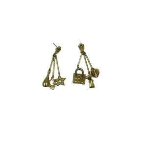 Pre-owned Dior gold star and padlock earrings