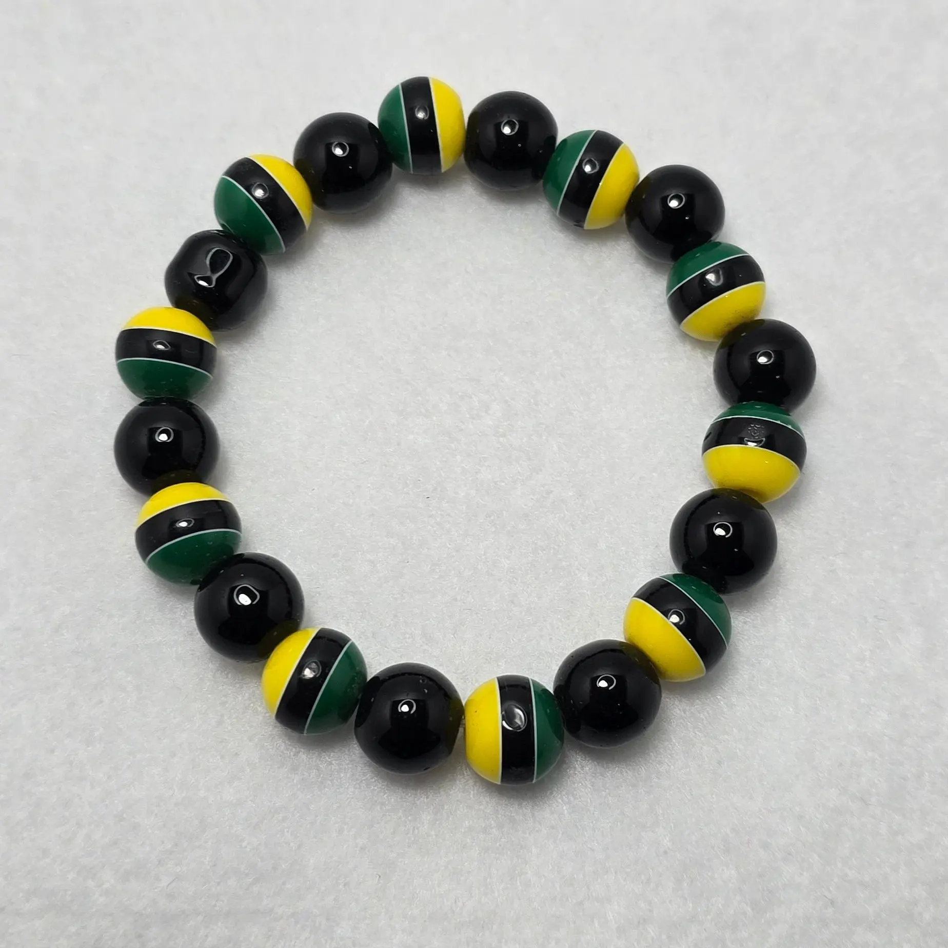 Jamaica Colored Glass Beaded Bracelet - Black Green & Gold Beads Bringing Memories of Jamaica