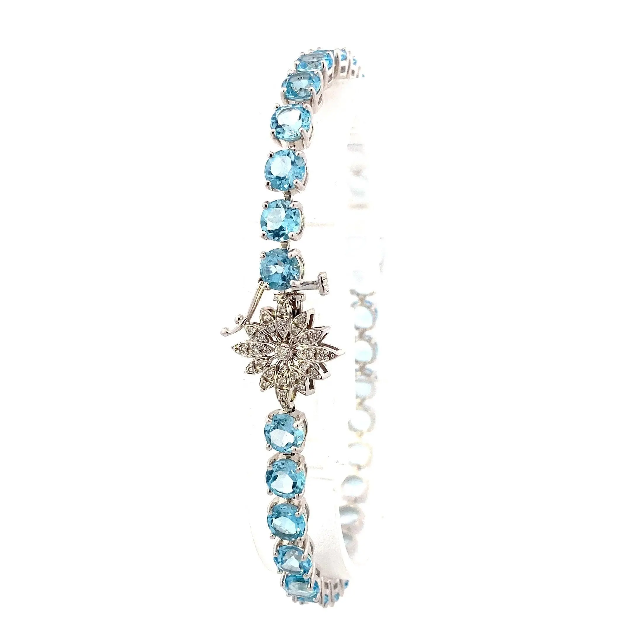 14K White Gold Blue Topaz Diamond Bracelet - 0.10ct