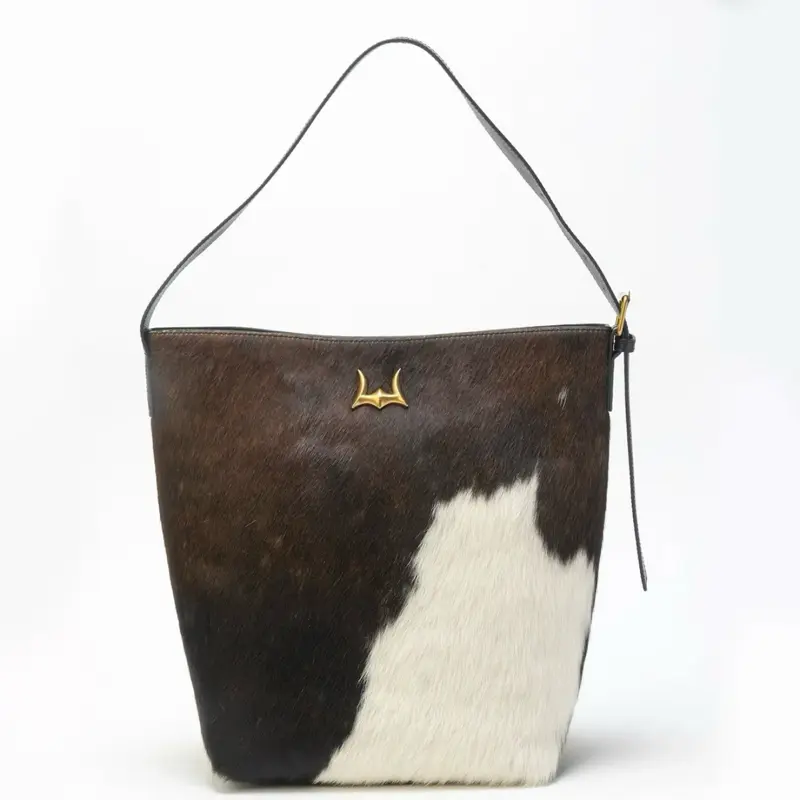 Women's Loyal West Clara Large Bucket Bag - Cowhide Pattern, Gold Embellishment, Bucket Purse