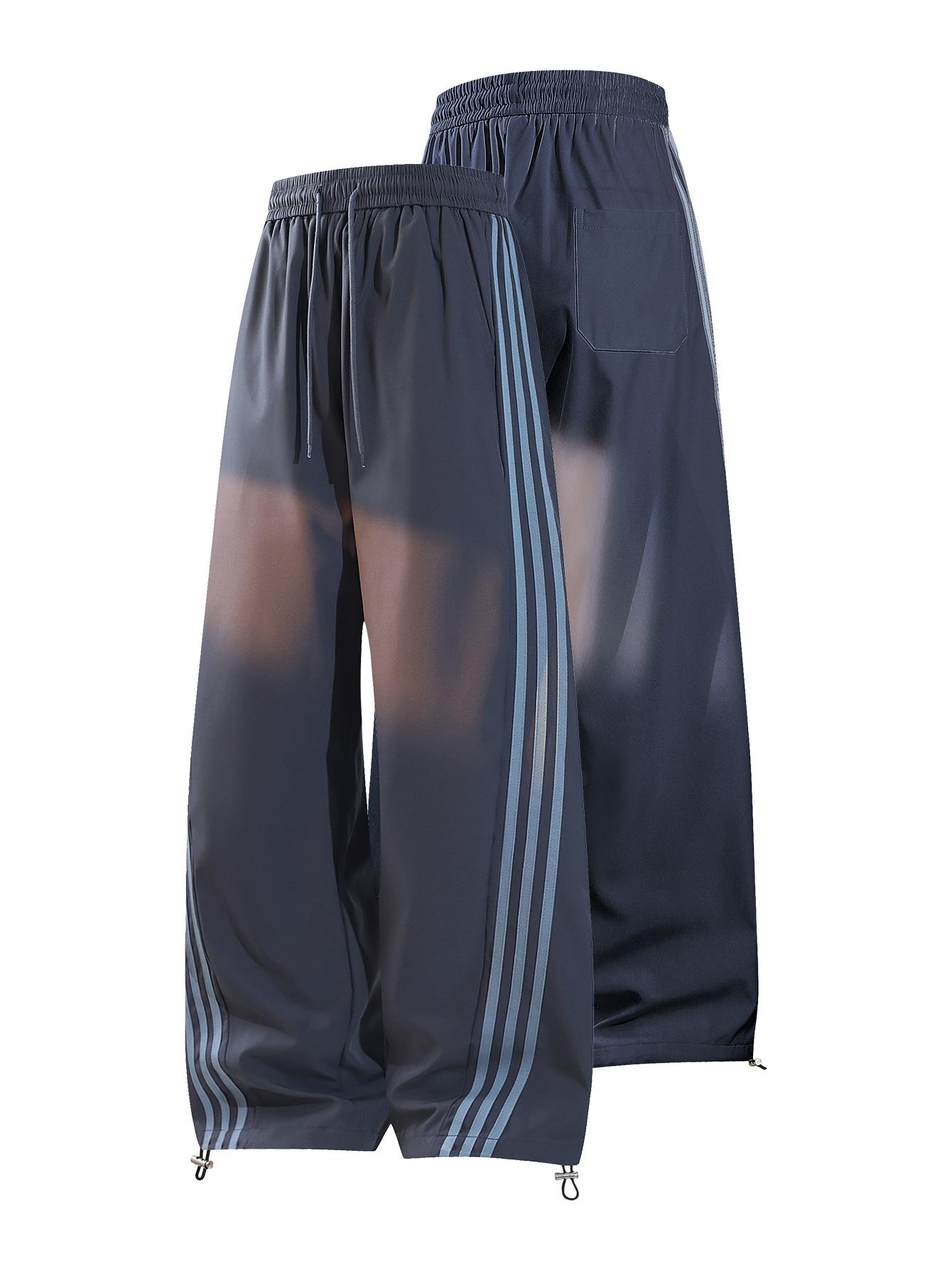 CCCMAI Men's color-block side stripe sports pants, all-season men's casual fashion trendy straight-leg pants with drawstring waistband, classic menswear sweatpants, loose casual pants, stylish activewear for men. Striped