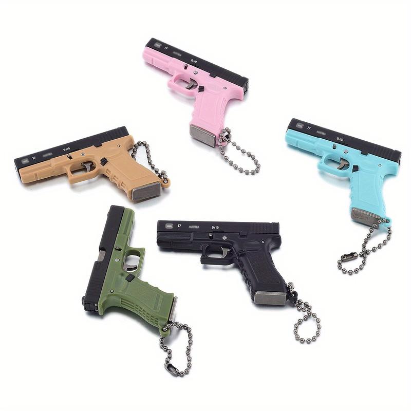 1-Piece Classic 1:3 Scale Glock G17 Miniature Keychain – Tactical Military-Themed Mini Keychain Pendant. Exquisitely crafted with high wear resistance, superior hardness, and durable metal construction. Gaming Collectors
