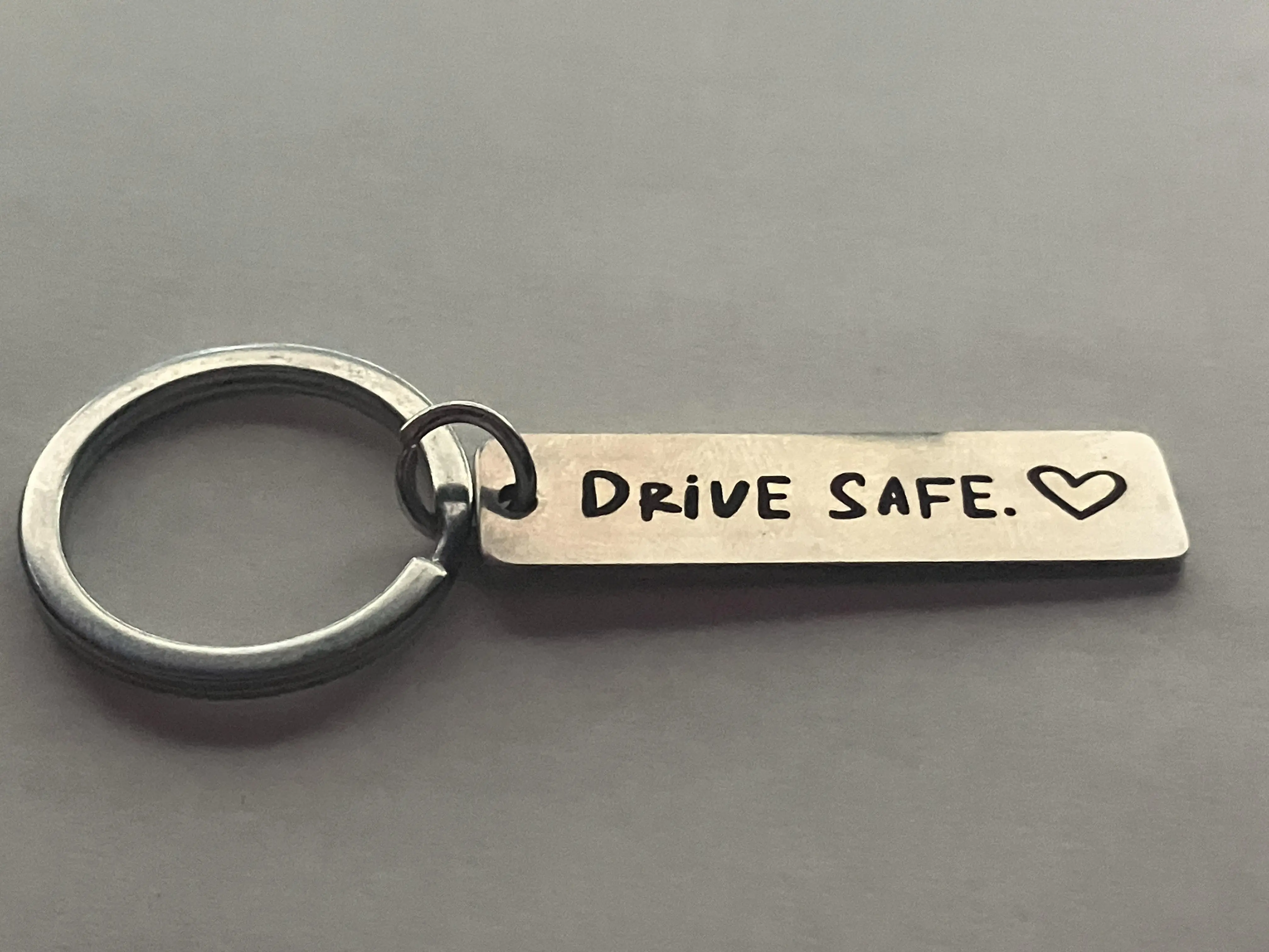 Drive safe laser engraved metal Keychain Grey
