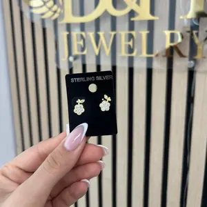 Aretes de flor pequeña plata 925