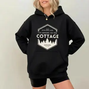 Women's Cozy Cotton Hoodie - "Coming to the Cottage 2026" Heated Rivalry Hockey Romance Themed Unisex Funny Fan Gift Top