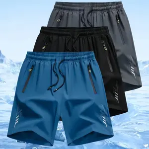 Men’s three pocket drawstring zip shorts in a sporty casual style. Elastic waistband with fluorescent green drawstrings adds a vibrant touch, side zipper pockets enhance practicality, and a small polka dot letter print provides visual recognition. Quick d