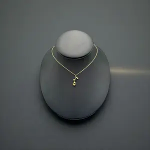 Solid 10k yellow gold chain with a rose pendant.