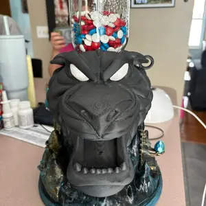 Cave of Wonders Inspired Candy Gumball Dispenser with Unique Monster Design and Vibrant Candy Colors