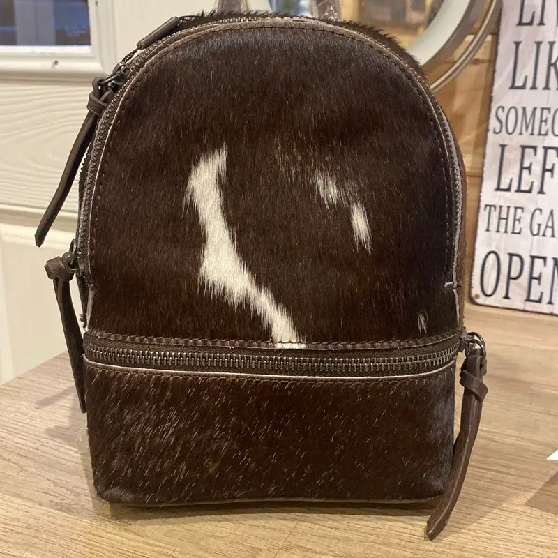 Montana West Trinity Ranch Genuine Hair-on Cowhide Mini Backpack for Adults, Female & Male, Dual Zipper Compartments, Logo Patch, Adjustable Straps, Built-in Organizer, Casual Functional Bag