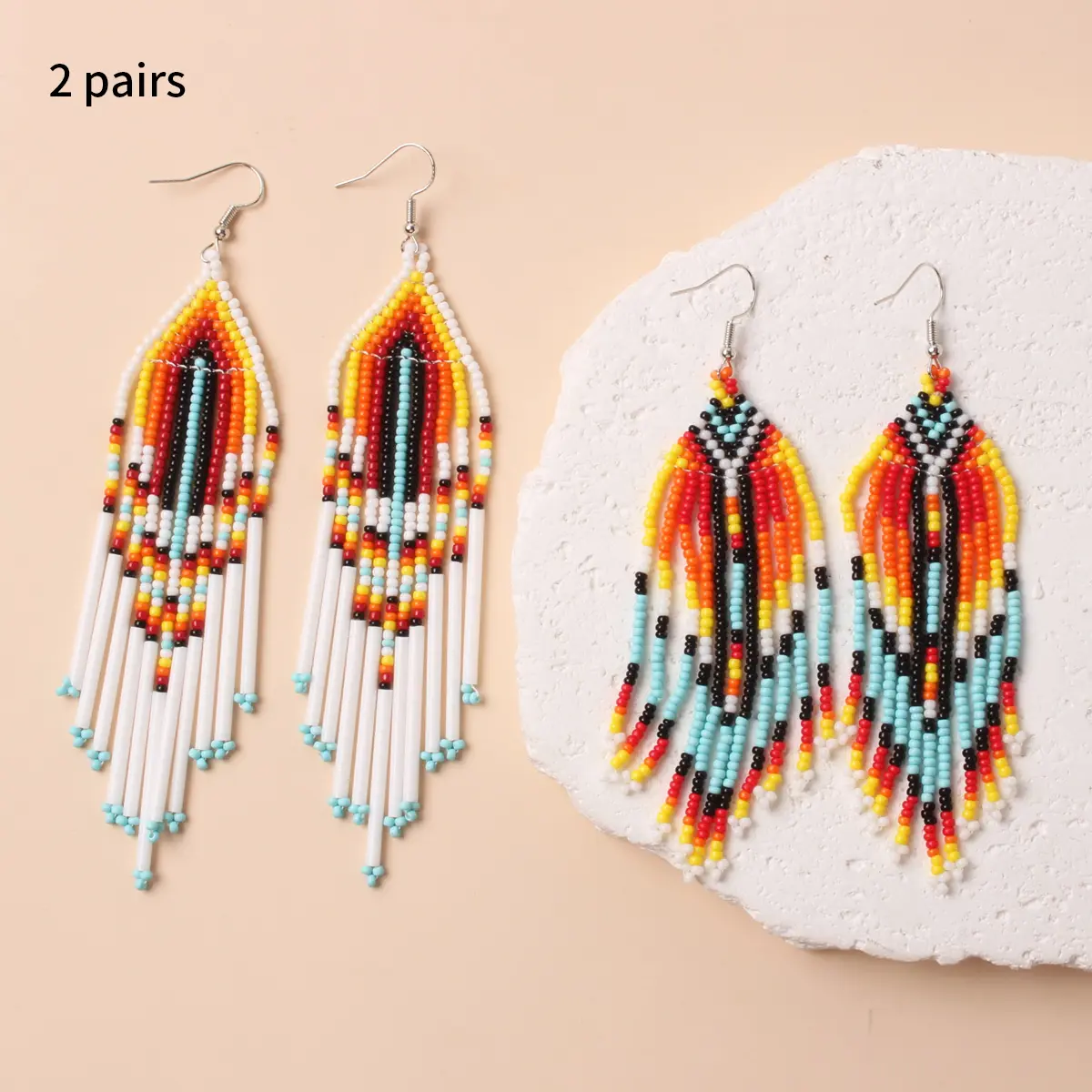 Two pairs of Bohemian-style colored rice bead tassel earrings are suitable for women to wear at daily parties