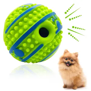 Interactive squeaky dog ​​toy ball spiked rocking ball that attracts the dog's attention when shaken allowing the dog to play independently and be trained to fetch
