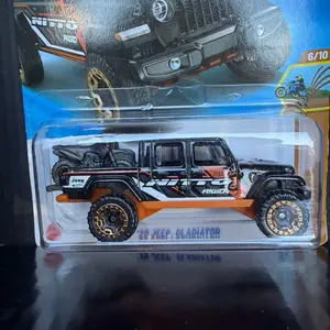 This is a Hot Wheels '20 Jeep Gladiator die-cast model car. It is part of the HW Dirt series, the 6th release out of 10 in the collection.  The model is number 130/250 in the mainline series.  It is a black die-cast model of a truck in 1:64 scale.