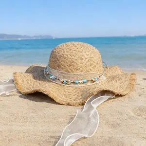 2026 New Summer Outdoor Travel Sun Hat for Women – Fashionable Beach/Coastal Wide-Brim Straw Hat with Fresh, Minimalist Woven Straw and a Flowing Wave Ribbon