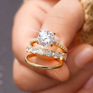 A set of three 14k gold-plated engagement rings for women, set with Zirconia stones, suitable for everyday wear and as gifts for friends and family.