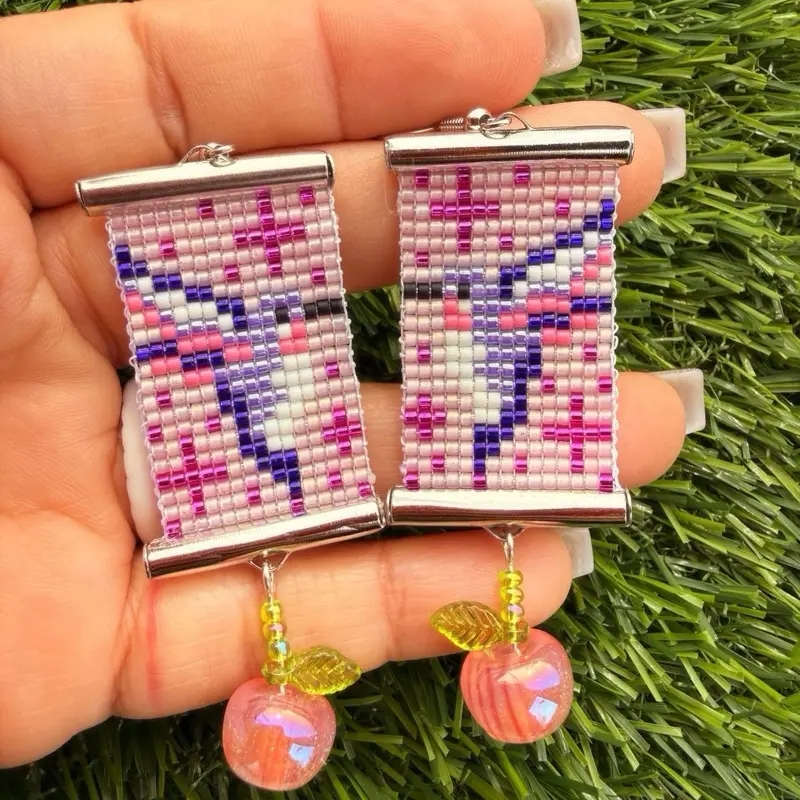 Native Made purple humming bird beaded earrings