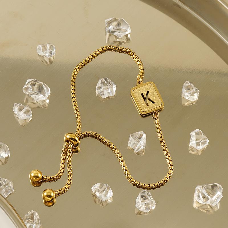 GGIRL Jewelry Adjustable Beaded Bracelet with Hollow Matte Initial Charm 18k Gold Plated Stainless Steel Bracelet Also Uncoated Versions Available Fashion Jewelry Gift for Holiday Haul Christmas Birthdays Anniversaries GGIRL Jewelry Adjustable Beaded Bracelet with Hollow Matte Initial Charm 18k Gold Plated Stainless Steel Bracelet Also Uncoated Versions Available Fashion Jewelry Gift for Holiday Haul Christmas Birthdays Anniversaries