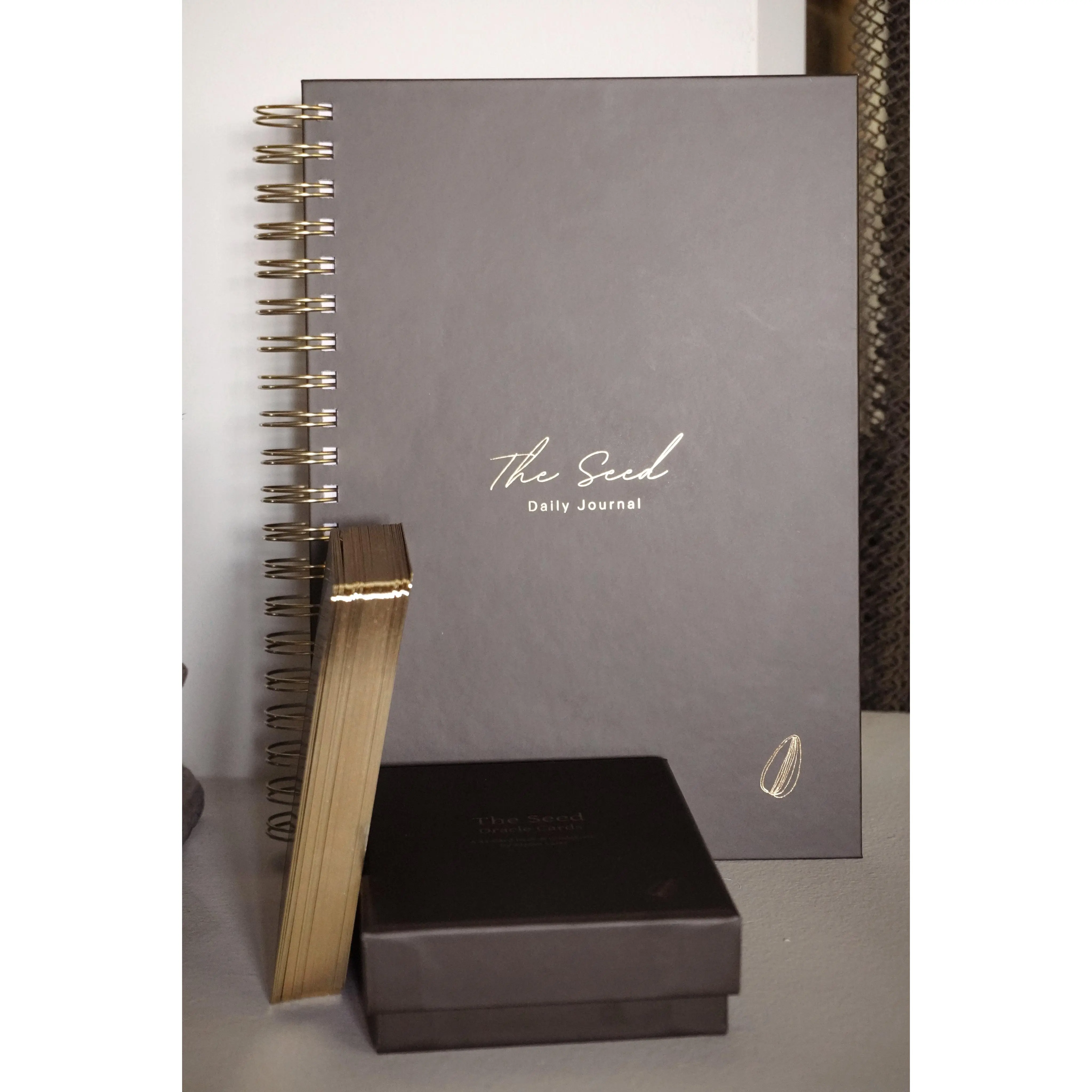 The Seed Bundle helps you uncover patterns and triggers, with space to record insights from the oracle cards so you can track repeating patterns. Includes a guided journal, oracle deck, 1 gold pen, and 12 markers for creative reflection.