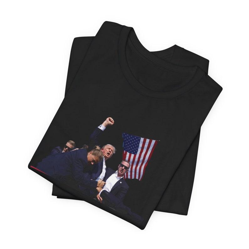 Trump 2024 T-shirt, Trump Assassination Shirt Design, Trump Supporter, Republican Shirt, I stand with Trump, Trump Fight, etro 90s Music Concert Tee, Trending Clothes, High Quality, Sport, Gift For Fan, Street Style, Many Colors Size S To XL, tiktok shop Trump 2024 T-shirt, Trump Assassination Shirt Design, Trump Supporter, Republican Shirt, I stand with Trump, Trump Fight, etro 90s Music Concert Tee, Trending Clothes, High Quality, Sport, Gift For Fan, Street Style, Many Colors Size S To XL, tiktok shop