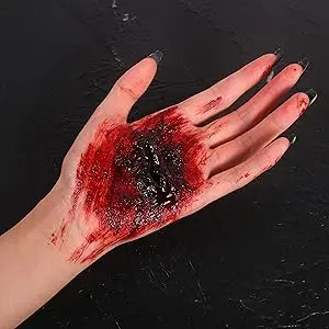 Thick fake blood creating a textured makeup effect