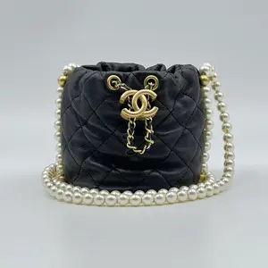 Pre-owned CHANEL Leather Mini Bags Mini Quilted Lambskin About Pearls Drawstring bucket bag