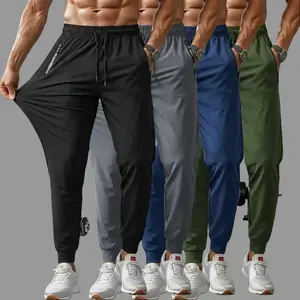 Men’s boyfriend-style athletic pants with a drawstring waist and zippered pockets, lightweight and breathable, suitable for gym workouts, cycling, outdoor activities, swimming, and running; quick-drying, cool, and stretchy fabric.