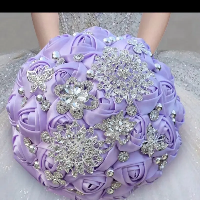 A light purple artificial rose bouquet with satin ribbons for bridesmaids, featuring handmade butterflies and pearls, perfect for weddings and lasting memories.