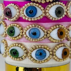 Elastic bracelets with 5 glass eyes, 5 different eye colors, all on a single bracelet.