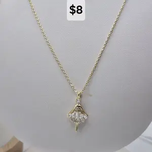 - Elegant Gold-Tone Ballerina Design Necklace for Women