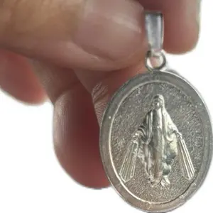 dije virgen milagrosa