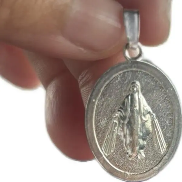 dije virgen milagrosa