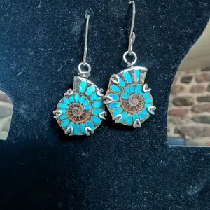 Ammonite with sleeping beauty turquoise inlay set in sterling silver