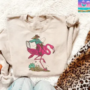 Buckling flamingo Crewneck & T-shirt, Western cowboy Graphic Hoodie, Trending western Graphic Hoodie, Western Boutique, Handmade, cowboy stuff, western sweatshirt, Outdoorsy gifts