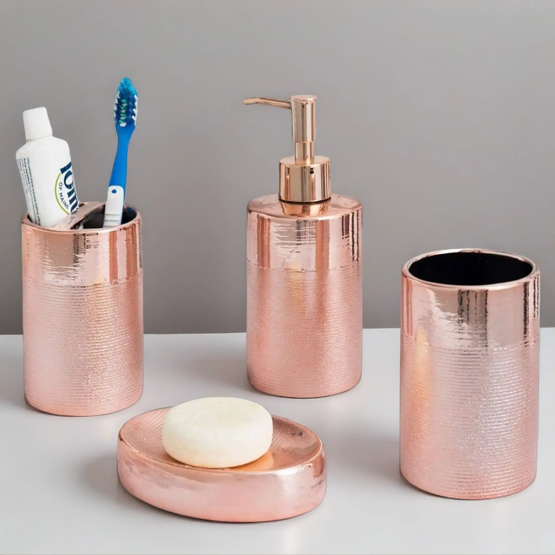 Watson 4-Piece Freestanding Modern Textured Ceramic Bathroom Accessory Set - Blush Pink, Champagne, Rose Gold, Boxed Bathroom Decor Upgrade, Includes Soap Dish, Pump Dispenser, Toothbrush Holder, Tumbler