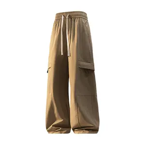 Trendy streetwear functional waterproof cargo pants; outdoor mountaineering jogger pants; loose casual softshell pants; spring unisex wide-leg cargo pants/paratrooper pants; fashionable, versatile loose long pants