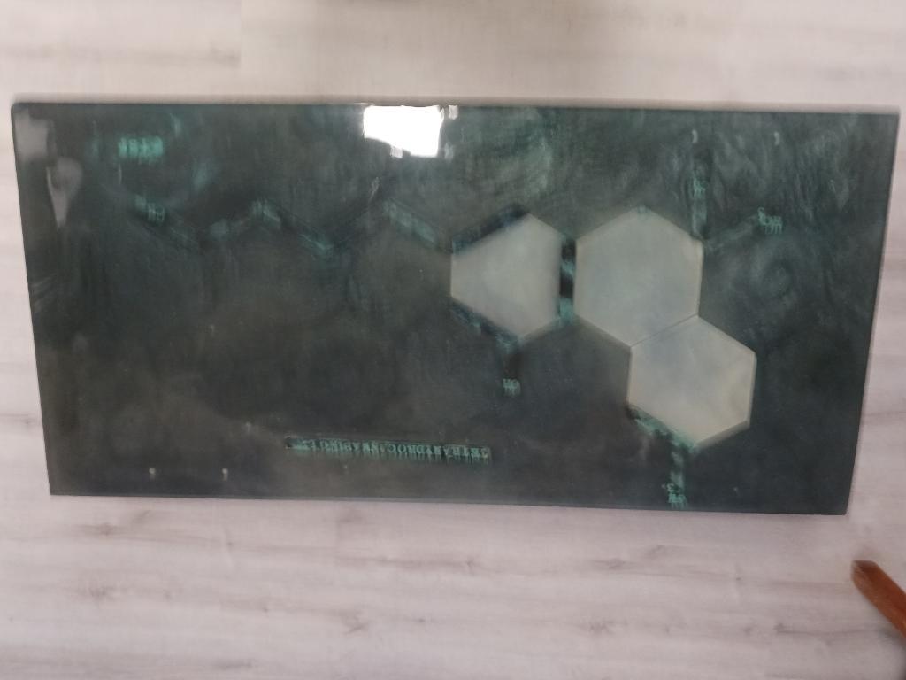 Cross Legs epoxy table featuring the tetrahydrocannabinol compound in multiple layers of epoxy providing a deep tridemtional feel