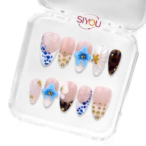 WILD PETALS Premium Handmade Press-On Nails Long-Lasting Short Almond Shape Glossy Pink, White, Blue Finish Vibrant Hand-Painted Blue Flowers Gold Accents Multi-Color Style