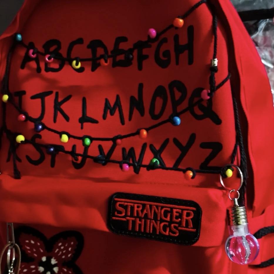 Stranger Things Backpack Shopping Bag Travel Bag Schoolbag Student WorkStudy Backpack Large Capacity Simple Design Red and Black Flower Pattern.