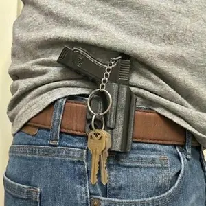The QuickDraw Keychain - Mini Pistol & Holster The QuickDraw Keychain - Mini Pistol & Holster