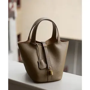 Lock-shaped design handbag – a stylish small bag with a secure locking mechanism and elegant handle, perfect for everyday use.