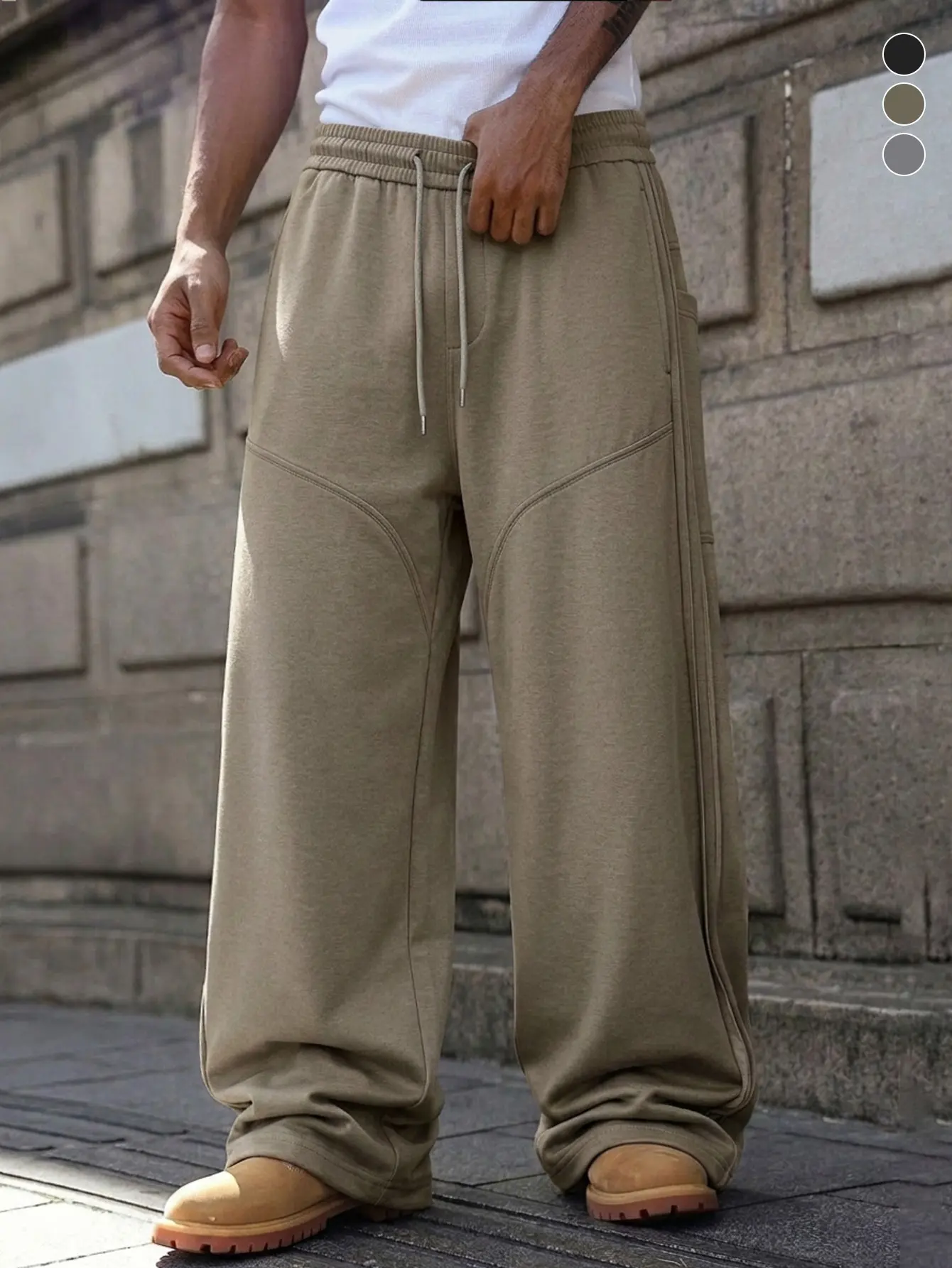 Men’s elastic-waist wide-leg sweatpants in khaki, loose fit, comfortable fabric—ideal for everyday streetwear and fitness, suitable for multiple occasions.