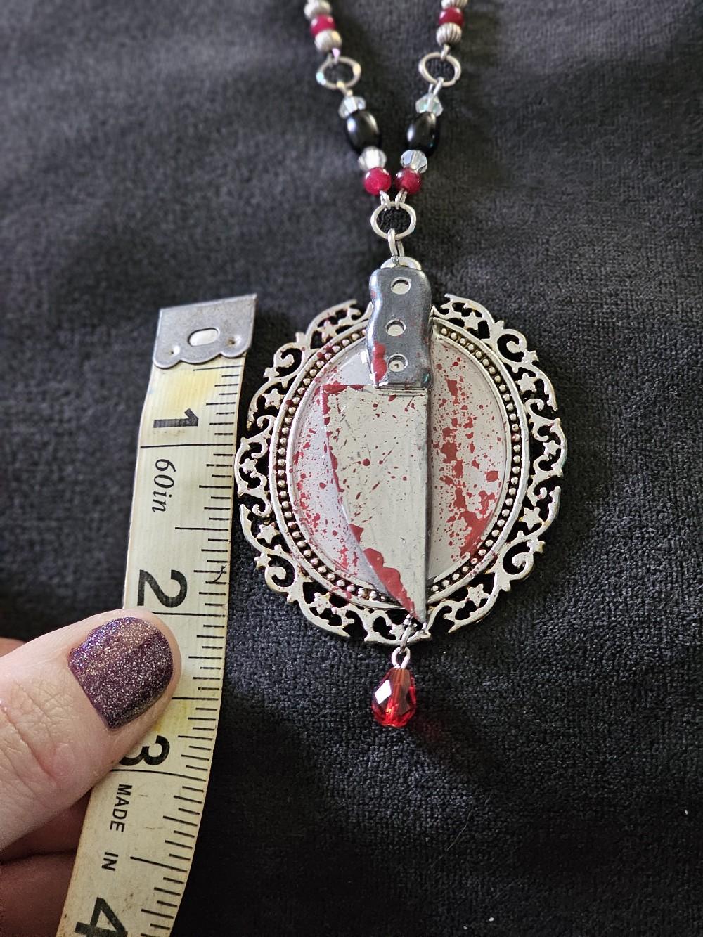 Just the tip bloody knife necklace