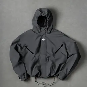 Men’s zip-up hooded jacket with a slightly open front, durable waterproof fabric, relaxed fit, urban functional style, suitable for everyday wear, lightweight athletic design, fashionable pullover hood.