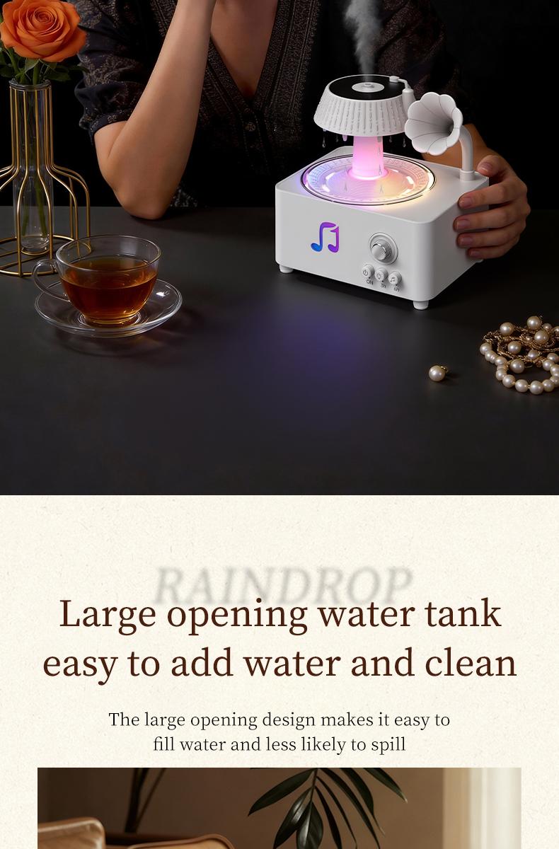 Phonograph-style aroma diffuser and humidifier with white noise and Bluetooth music, includes essential oils, features multiple natural sounds, automatic shut-off when water runs out, and ultrasonic raindrop rotation. A high-end white aroma diffuser gift.